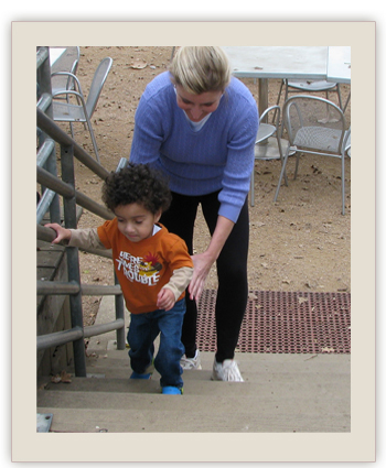 child and pt on stairs